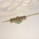 Jadau choker with green and rubypink beads