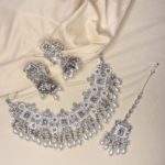 White necklace set with earrings