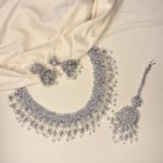 White necklace set with earrings